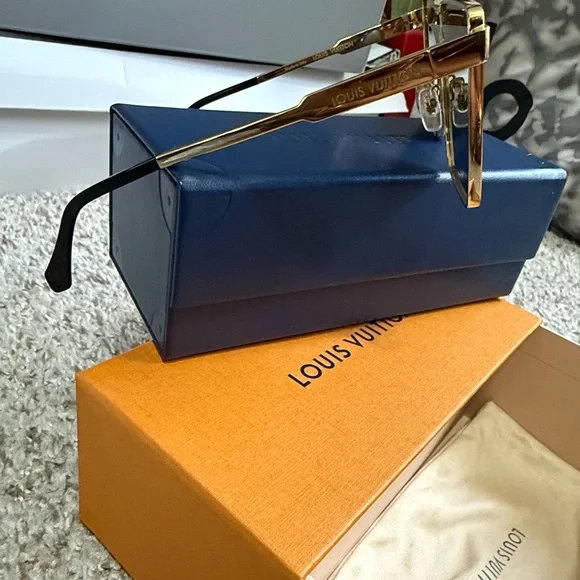 Authentic Louis Vuitton Black and Gold Star Detail Sunglasses - Picture 2 of 3